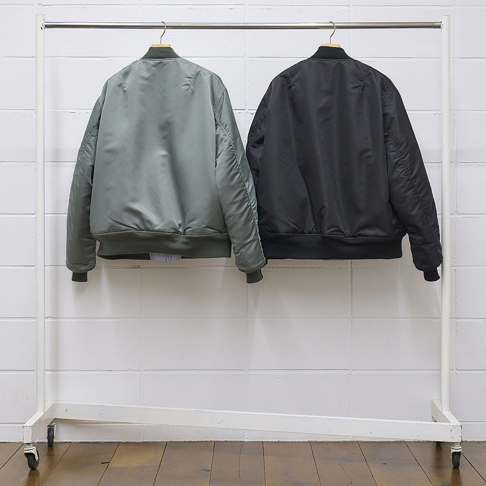 史上初の全面リフレクターを採用。UNUSED × BUZZ RICKSON'SのMA-1