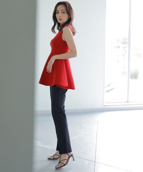 anuans（アニュアンス）の「ホールガーメントペプラムニットプル